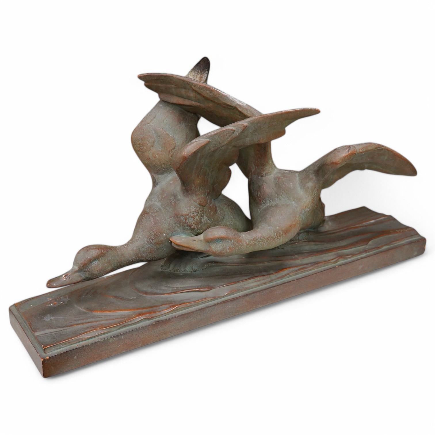 A terracotta bronze effect mallard duck group, stamped on base R Pollin. 72cm long. Condition - good